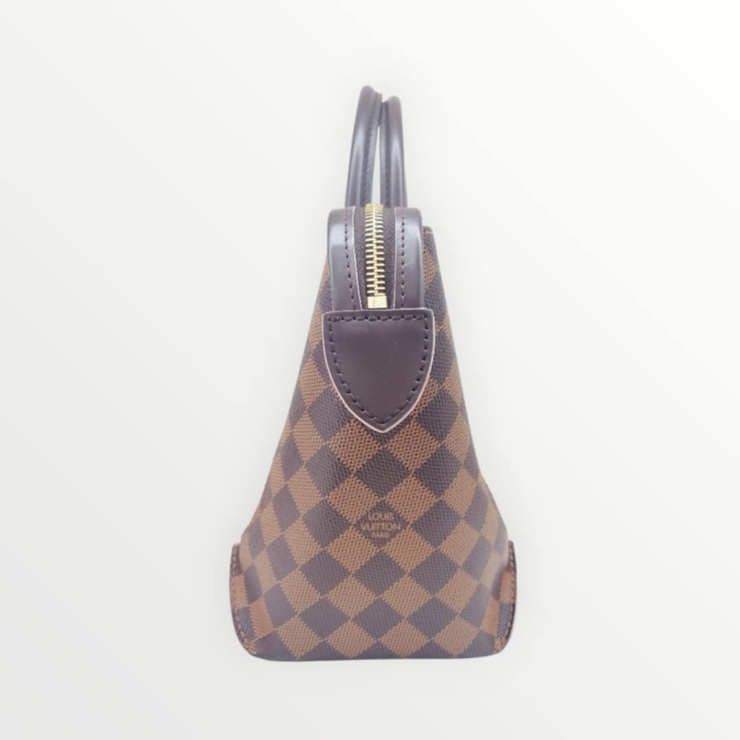 LOUIS VUITTON CAISSA PM