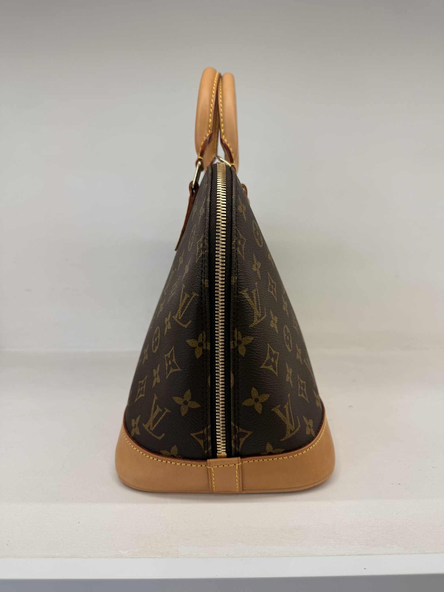 LOUIS VUITTON ALMA PM
