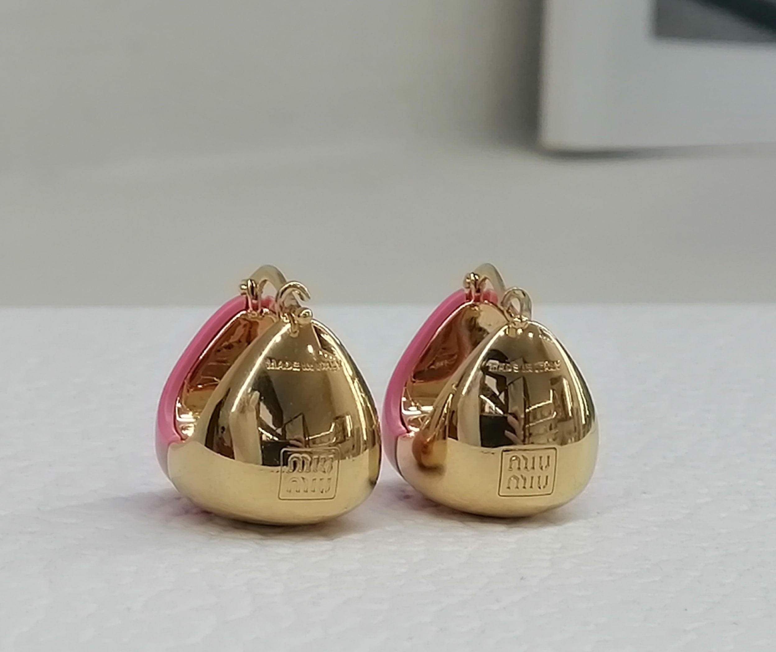 MIU MIU ORECCHINI IN METALLO SMALTATO