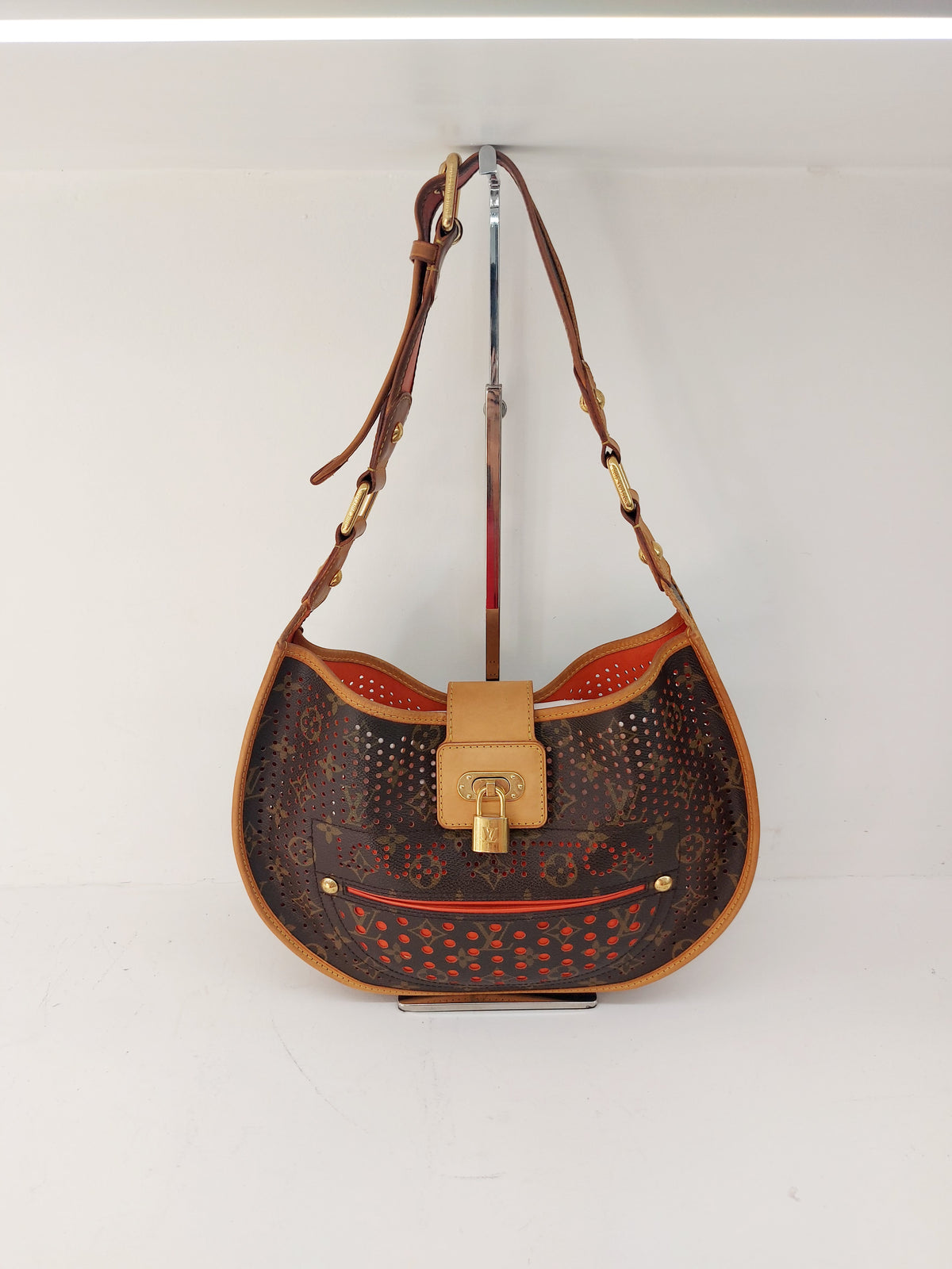 LOUIS VUITTON LIMITED EDITION ORANGE PERFORATED DEMI LUNE