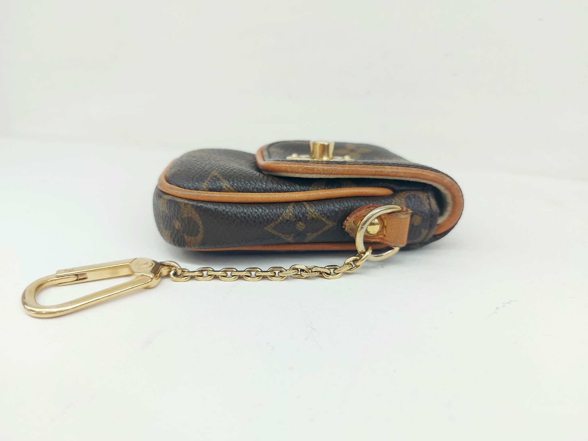LOUIS VUITTON TULUM MINI POCHETTE