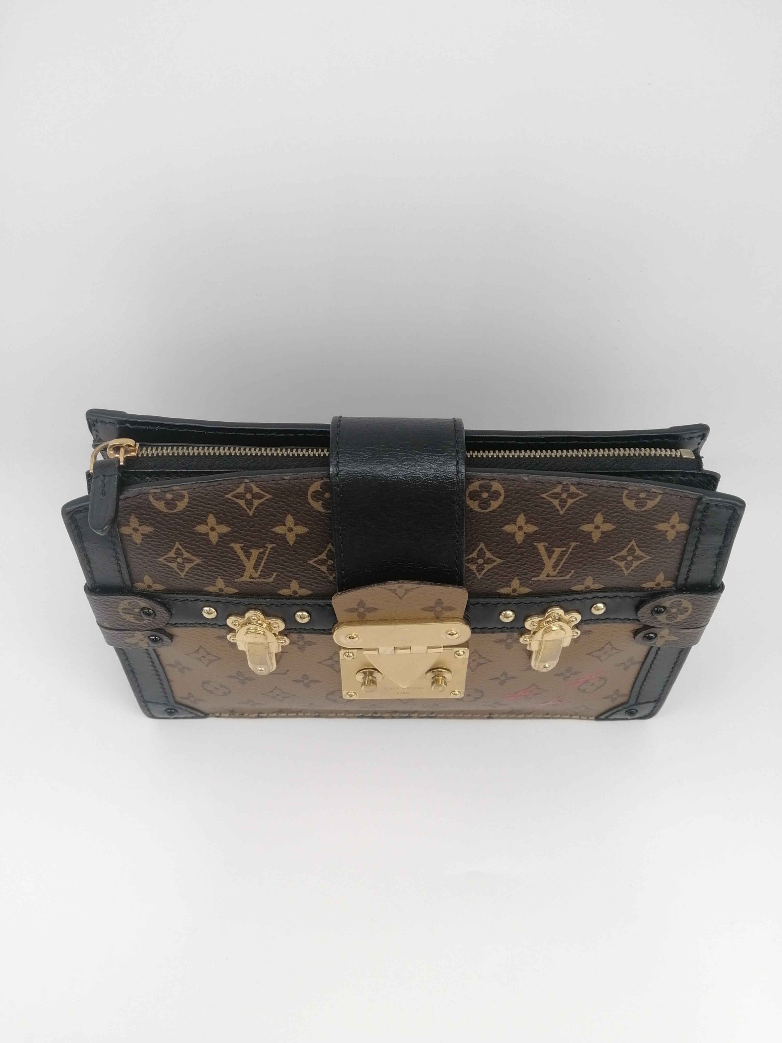 LOUIS VUITTON TRUNK CLUTCH REVERSE