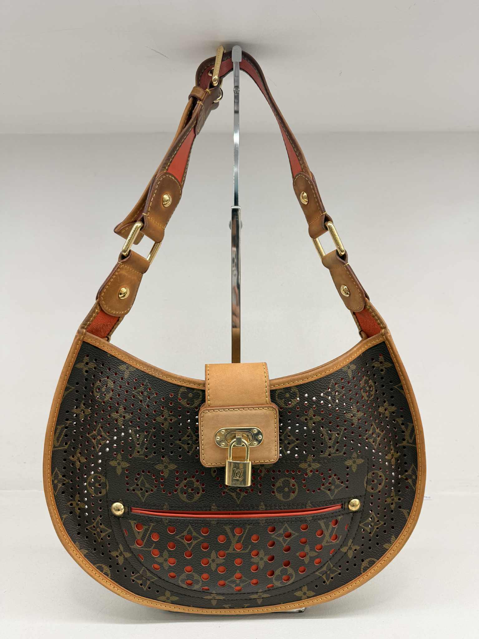 LOUIS VUITTON LIMITED EDITION ORANGE PERFORATED DEMI LUNE