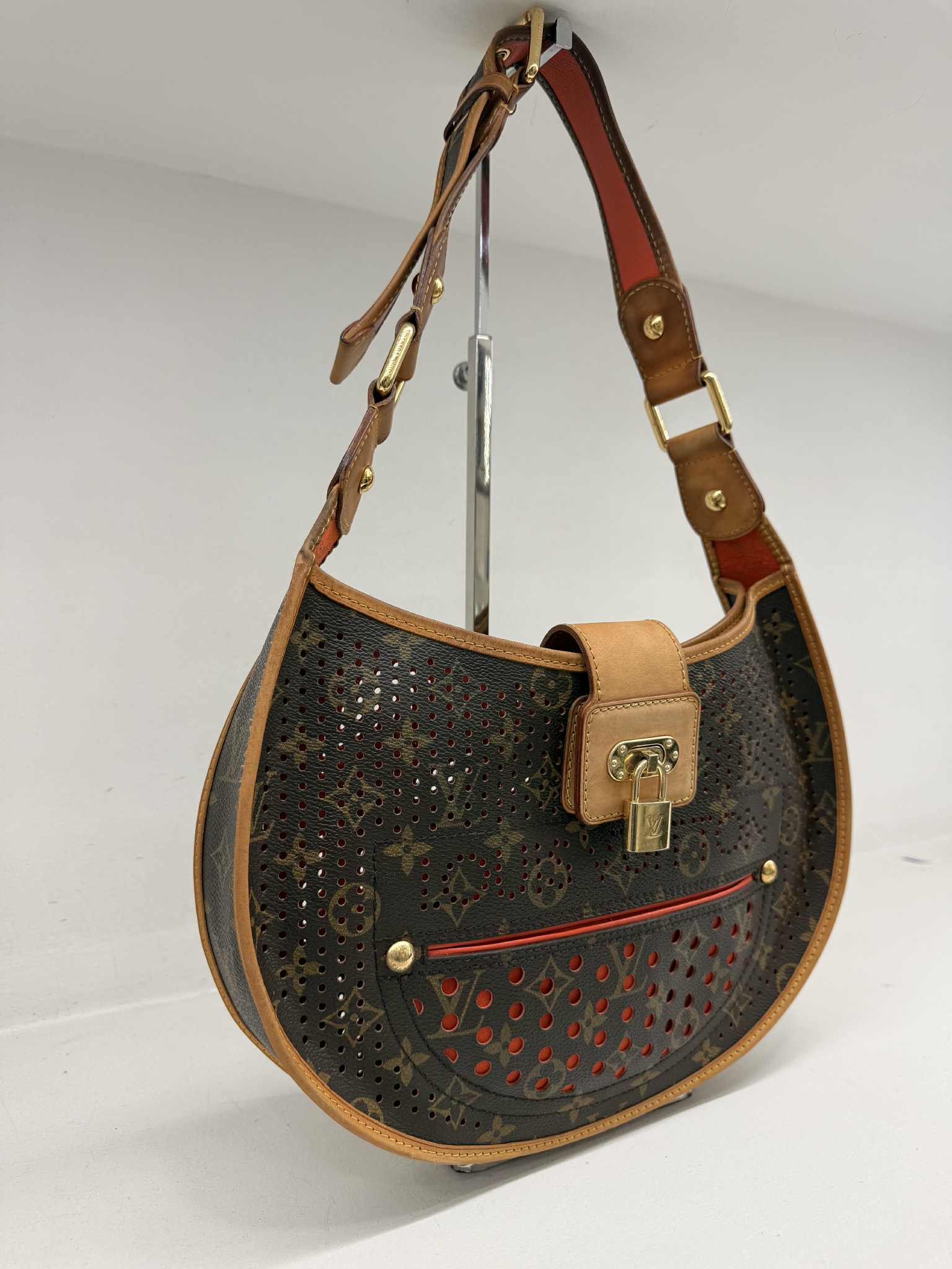 LOUIS VUITTON LIMITED EDITION ORANGE PERFORATED DEMI LUNE