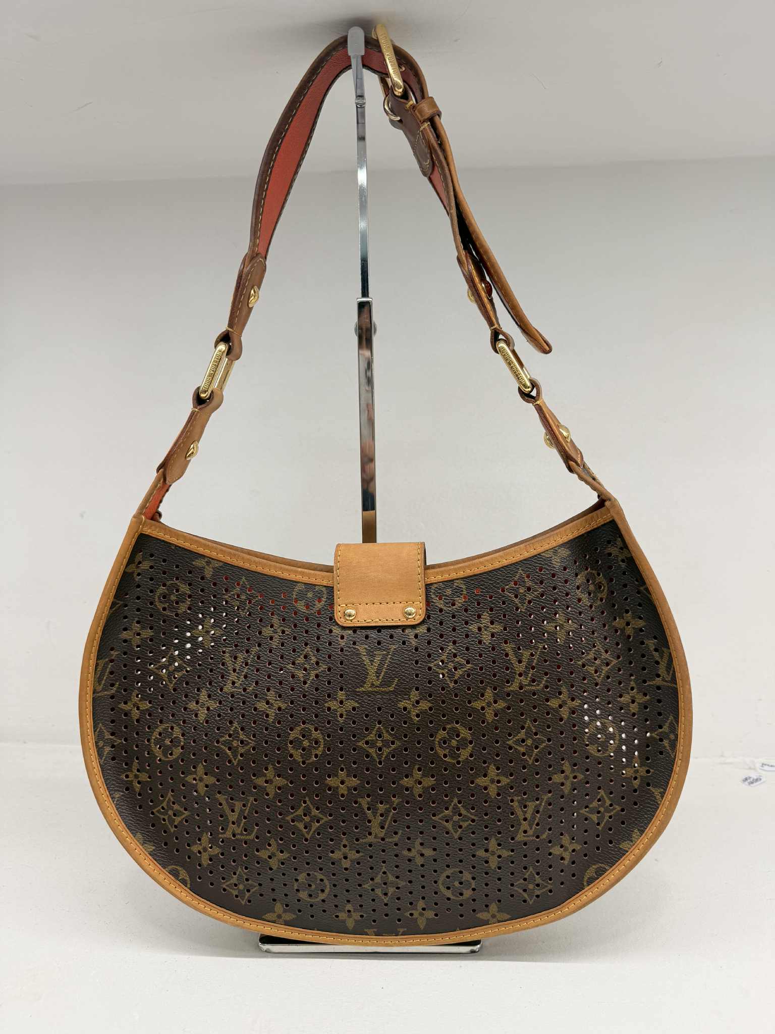LOUIS VUITTON LIMITED EDITION ORANGE PERFORATED DEMI LUNE