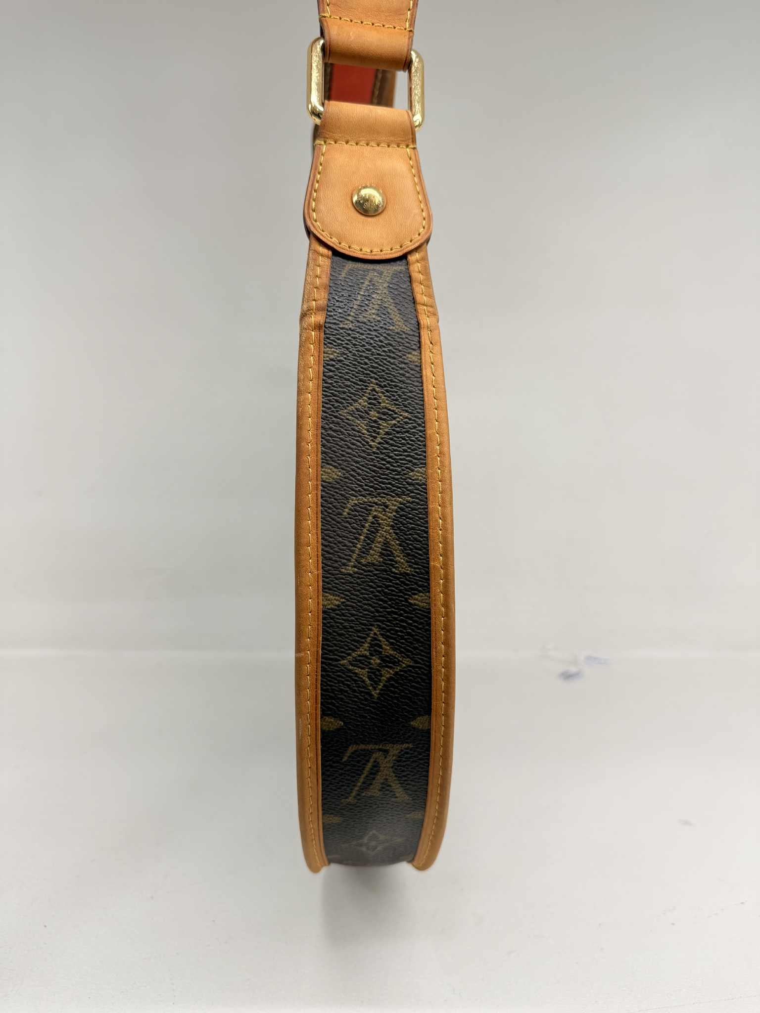 LOUIS VUITTON LIMITED EDITION ORANGE PERFORATED DEMI LUNE