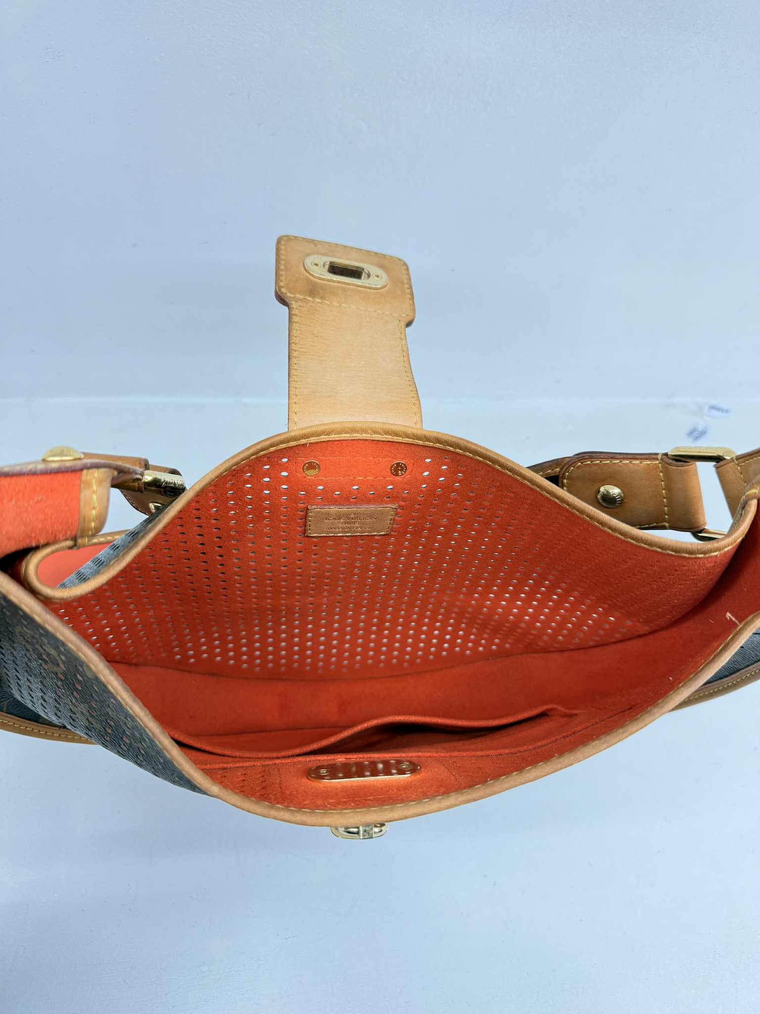 LOUIS VUITTON LIMITED EDITION ORANGE PERFORATED DEMI LUNE