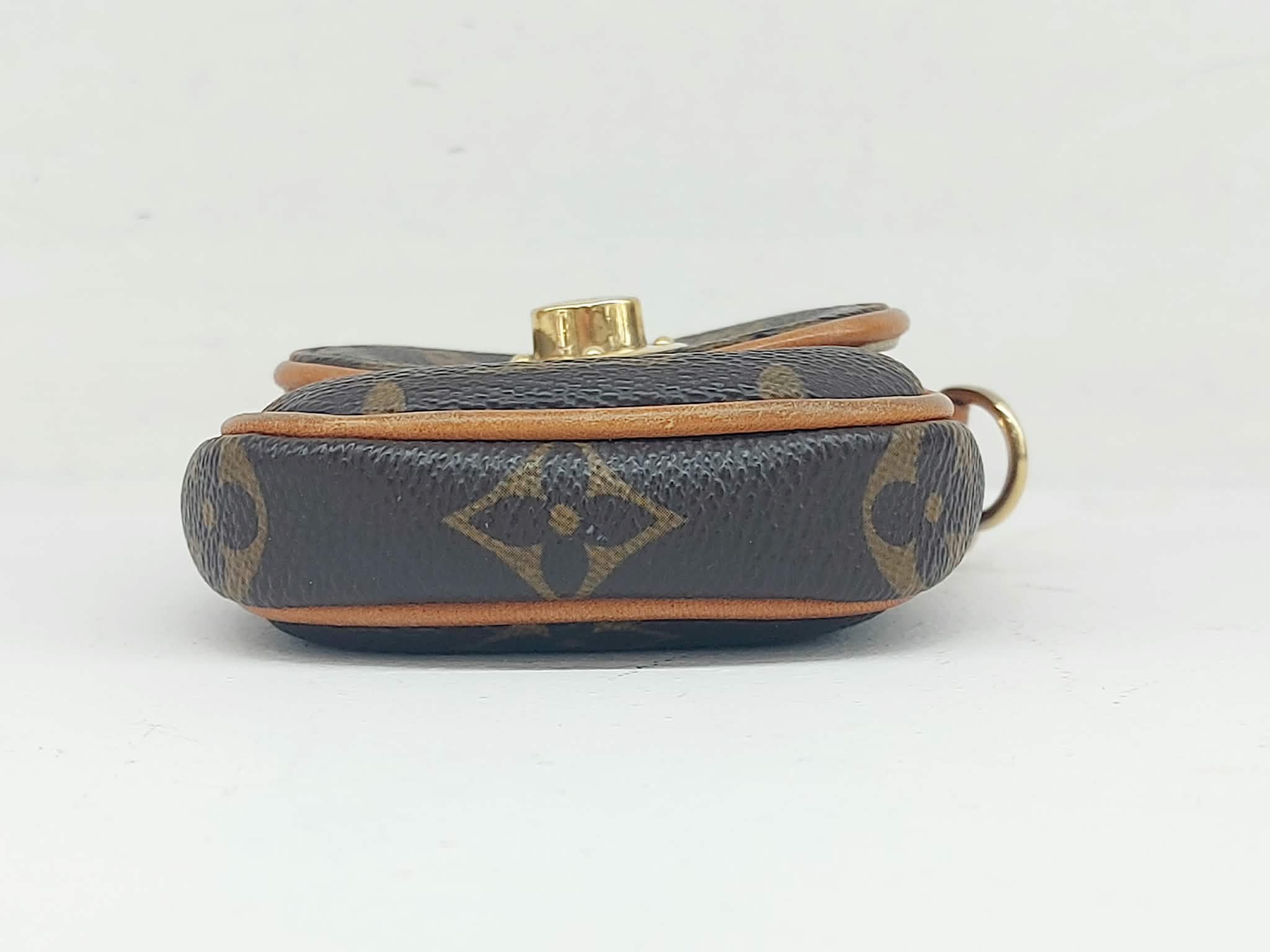 LOUIS VUITTON TULUM MINI POCHETTE