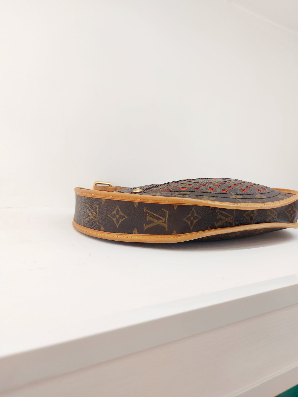 LOUIS VUITTON LIMITED EDITION ORANGE PERFORATED DEMI LUNE