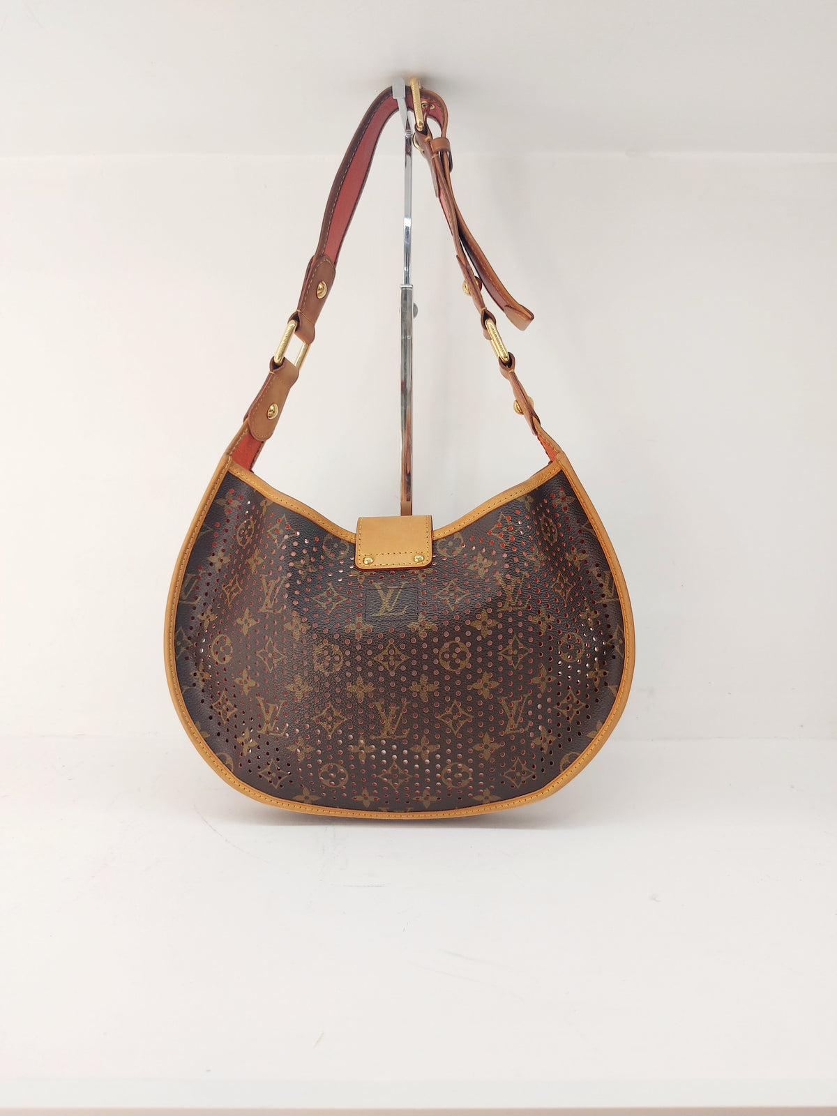 LOUIS VUITTON LIMITED EDITION ORANGE PERFORATED DEMI LUNE